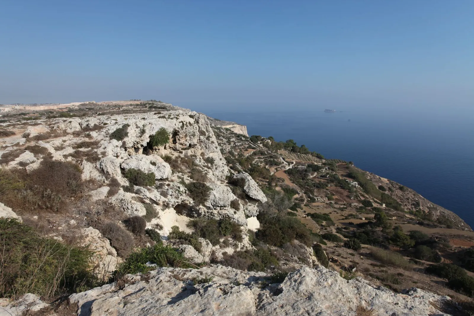Dingli’s coastal cliffs with the islet of Filfla out at sea.