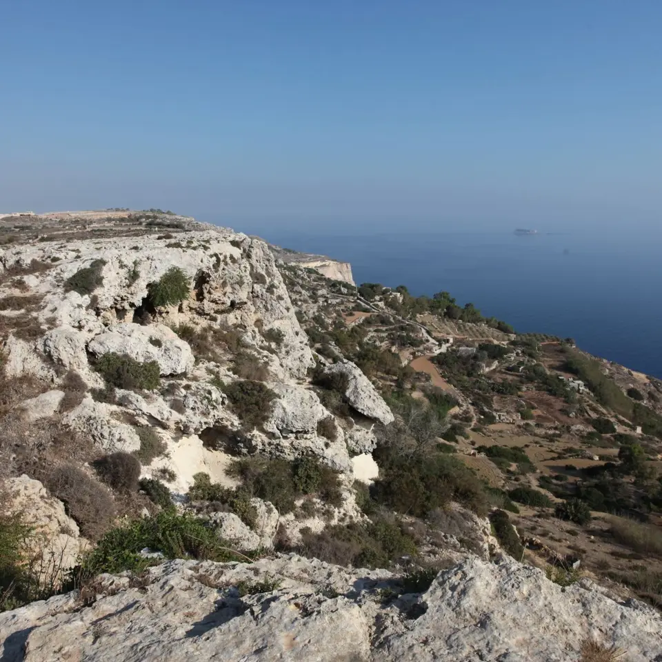 Dingli’s coastal cliffs with the islet of Filfla out at sea.