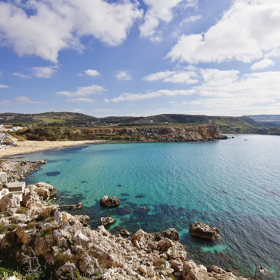 Sand, blue sea and the north-west coastline at Golden Bay.