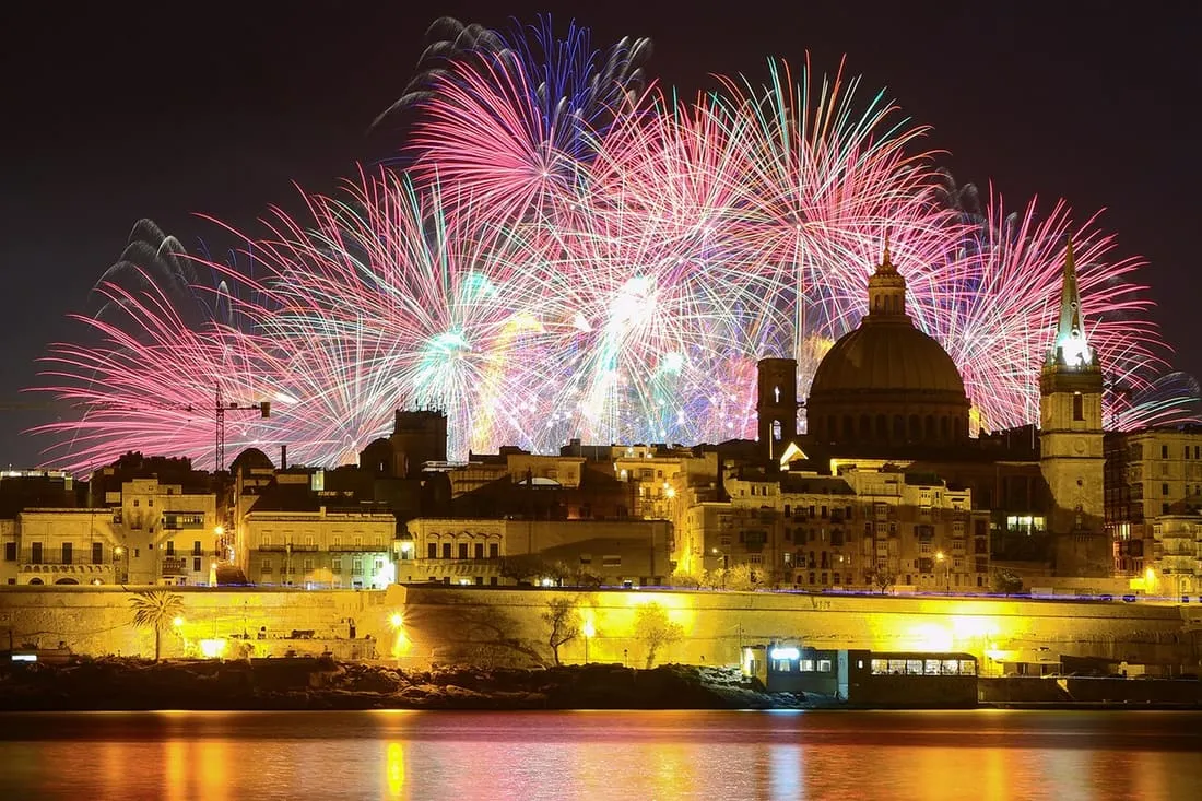 The dome of the Basilica of Our Lady of Mount Carmel, with fireworks lighting Valletta’s skyline.
